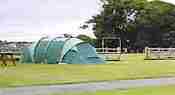 Tenting area at Y Fronydd Caravan Park